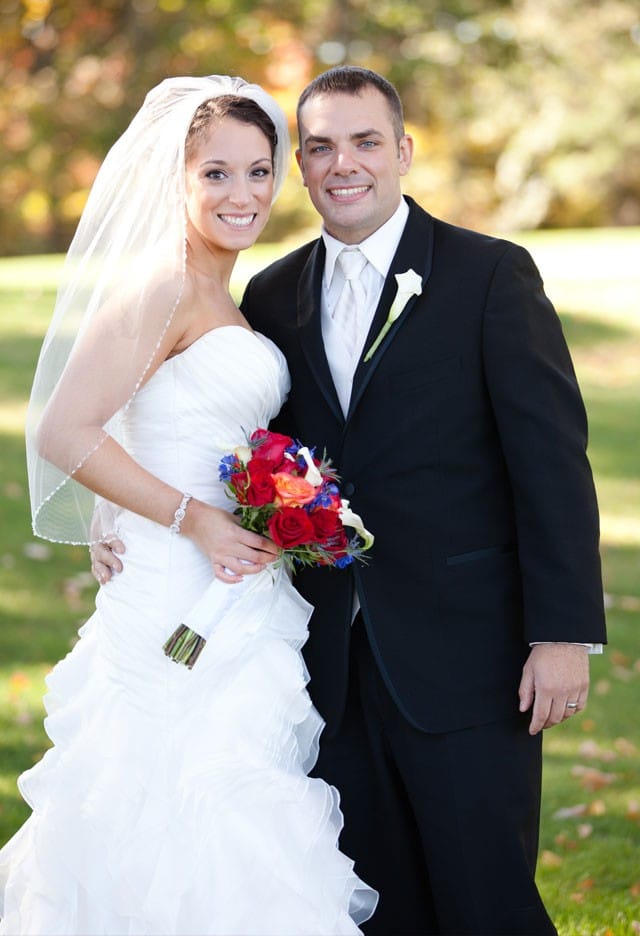 Maggie Bride, Gina, wearing an organza A-line wedding dress.