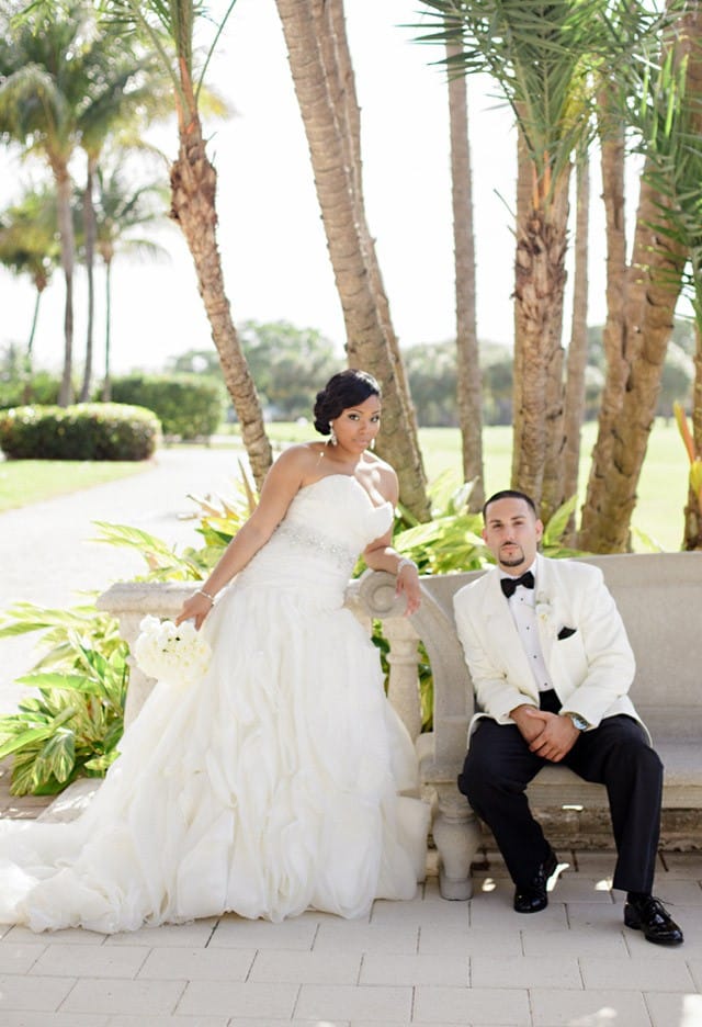 Beautiful Maggie Bride wearing Fantasia in a glamorous outdoor wedding.